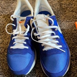 Blue white black bottom Nike sport shoes 11.5